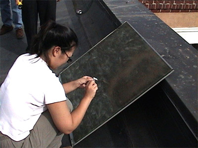Collecting a surface tape sample